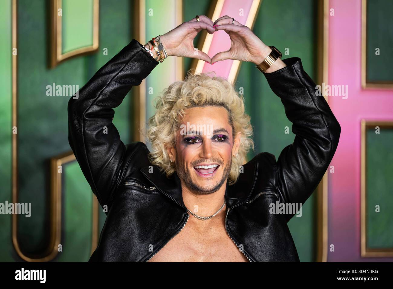 Frankie Grande poses for photographers upon arrival at the premiere of ...