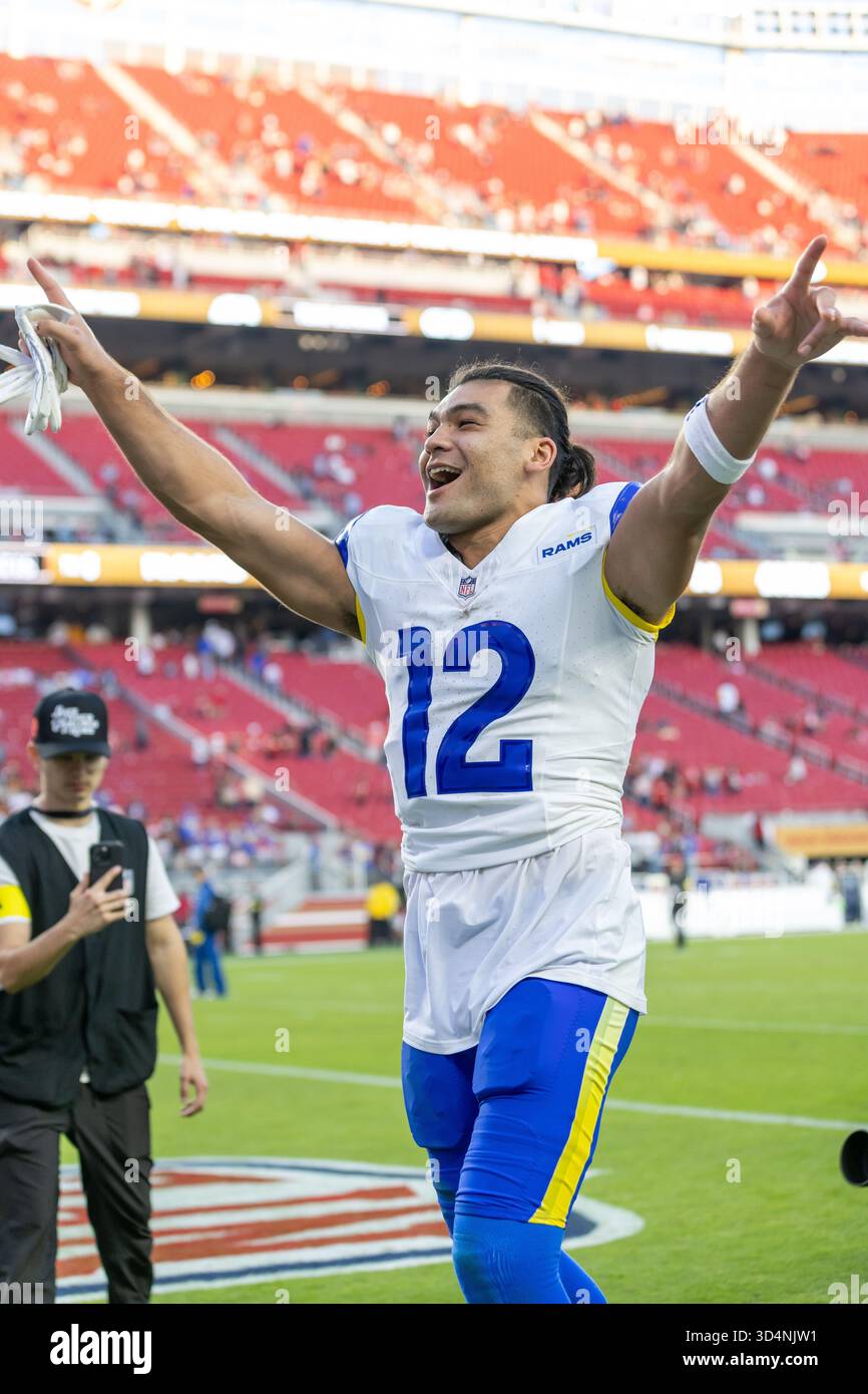 Los Angeles Rams wide receiver Puka Nacua (12) walks off the field ...
