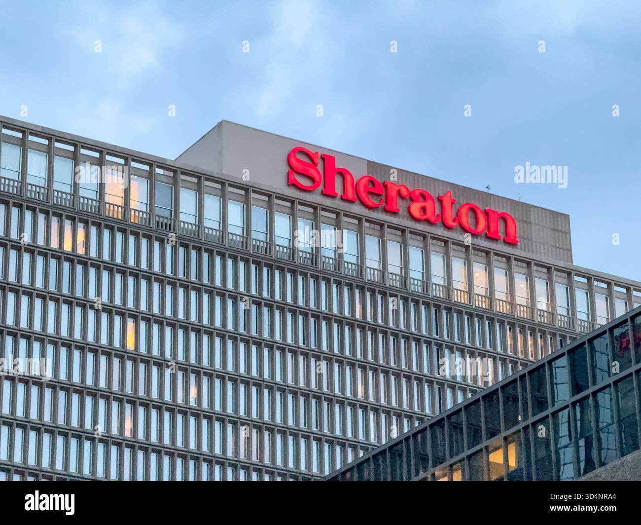 Denver, Colorado, USA - 2 June 2025: Exterior view of the Sheraton hotel in downtown Denver - Smartphone Captured Stock Image