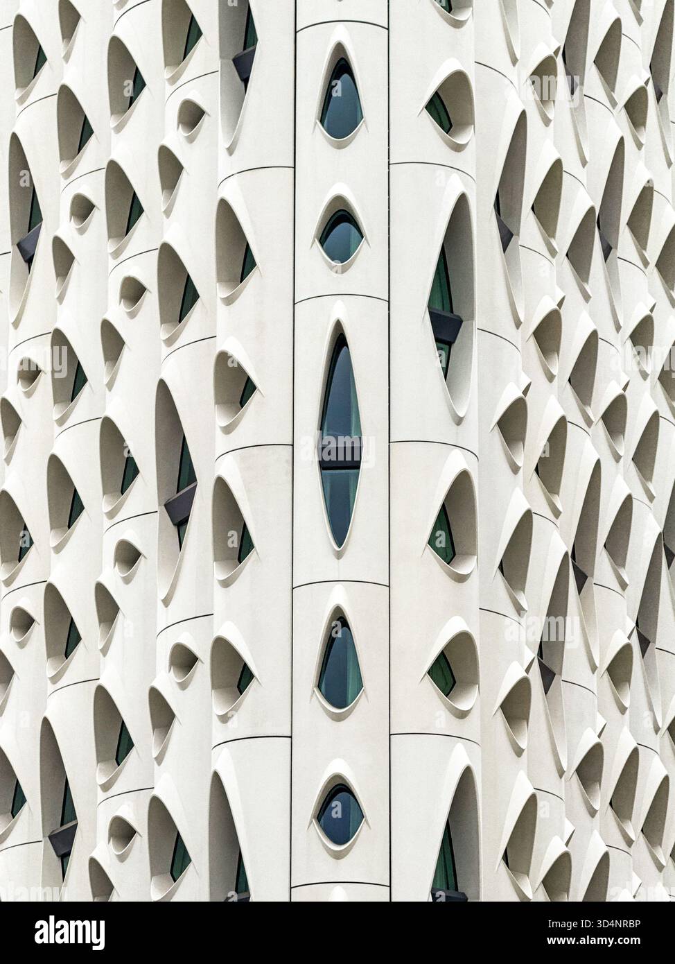 Denver, Colorado, USA - 2 June 2025: Close up of the exterior of the Populus Hotel in downtown Denver. The design has been compared to that of a chees - Smartphone Captured Stock Image