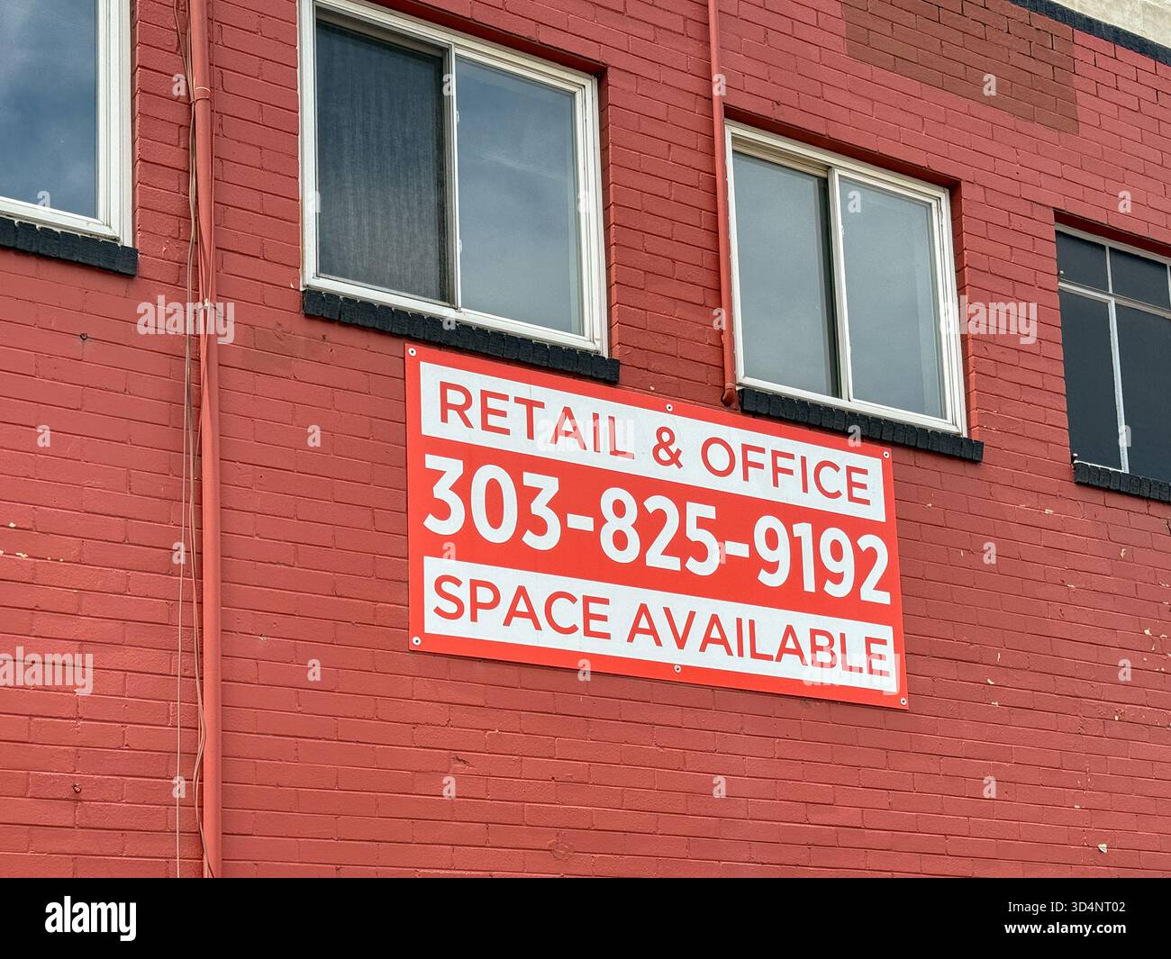 Denver, Colorado, USA - 2 June 2025: Sign on the outside of a commercial building in downtown Denver advertising space available for retail or office - Smartphone Captured Stock Image