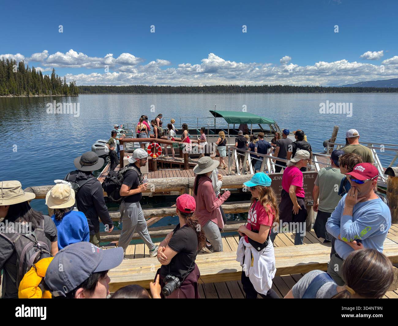 Jackson, Wyoming, USA - 28 May 2025: People queuing to catch a  boat across Sally Lake to return to the visitor centre in the Grand Teton National Par - Smartphone Captured Stock Image