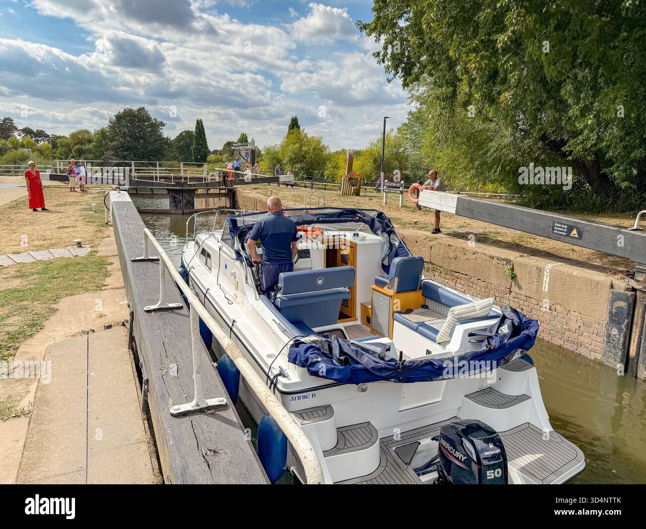 Worcester, Worcestershire, England, UK - 24 August 2025: Motor cruiser entering the Dignis Bottom Lock on the Worcester and Birmingham Canal. - Smartphone Captured Stock Image