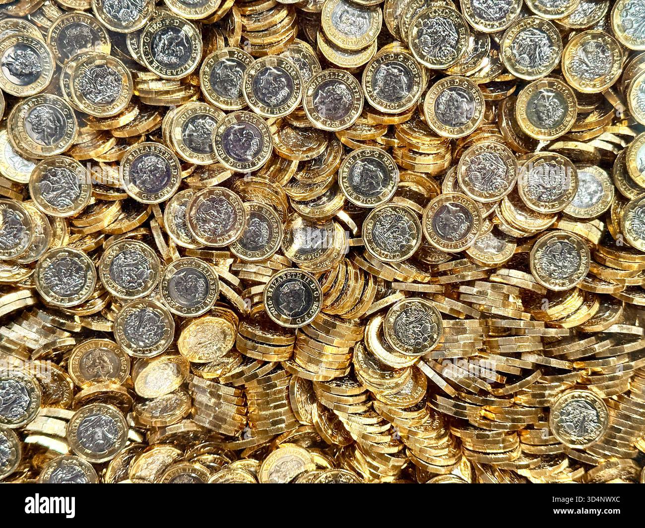 Large number of British one pound coins, Backgrounds. No people. - Smartphone Captured Stock Image