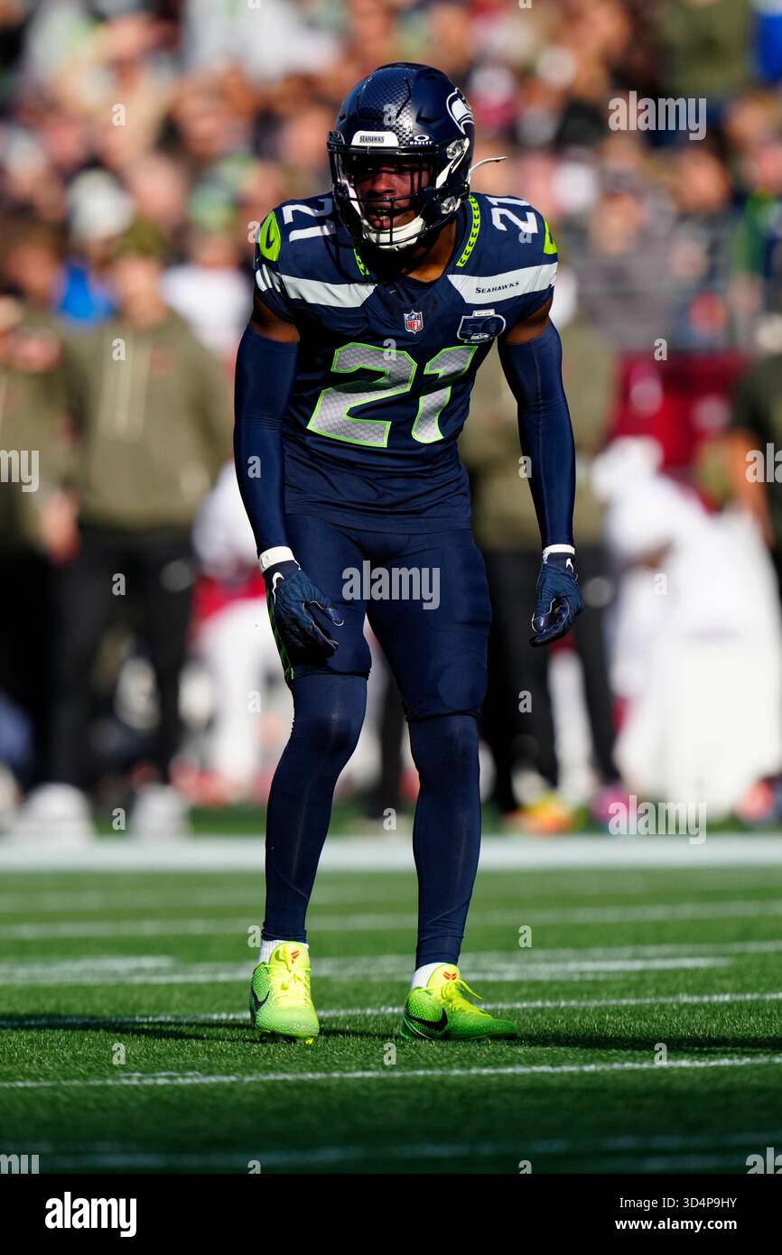 Seattle Seahawks cornerback Devon Witherspoon (21) gets set during an ...