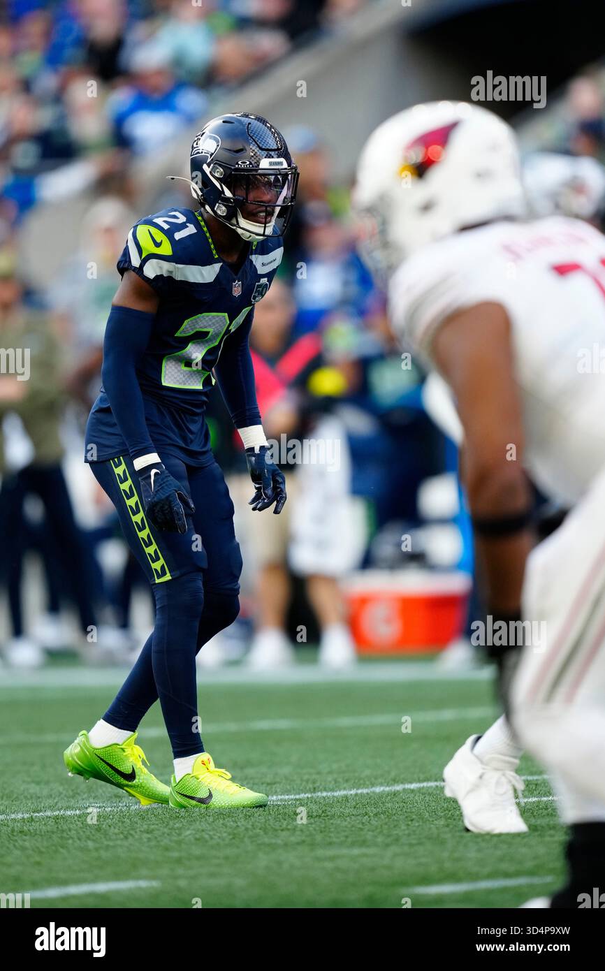 Seattle Seahawks cornerback Devon Witherspoon (21) gets set during an ...