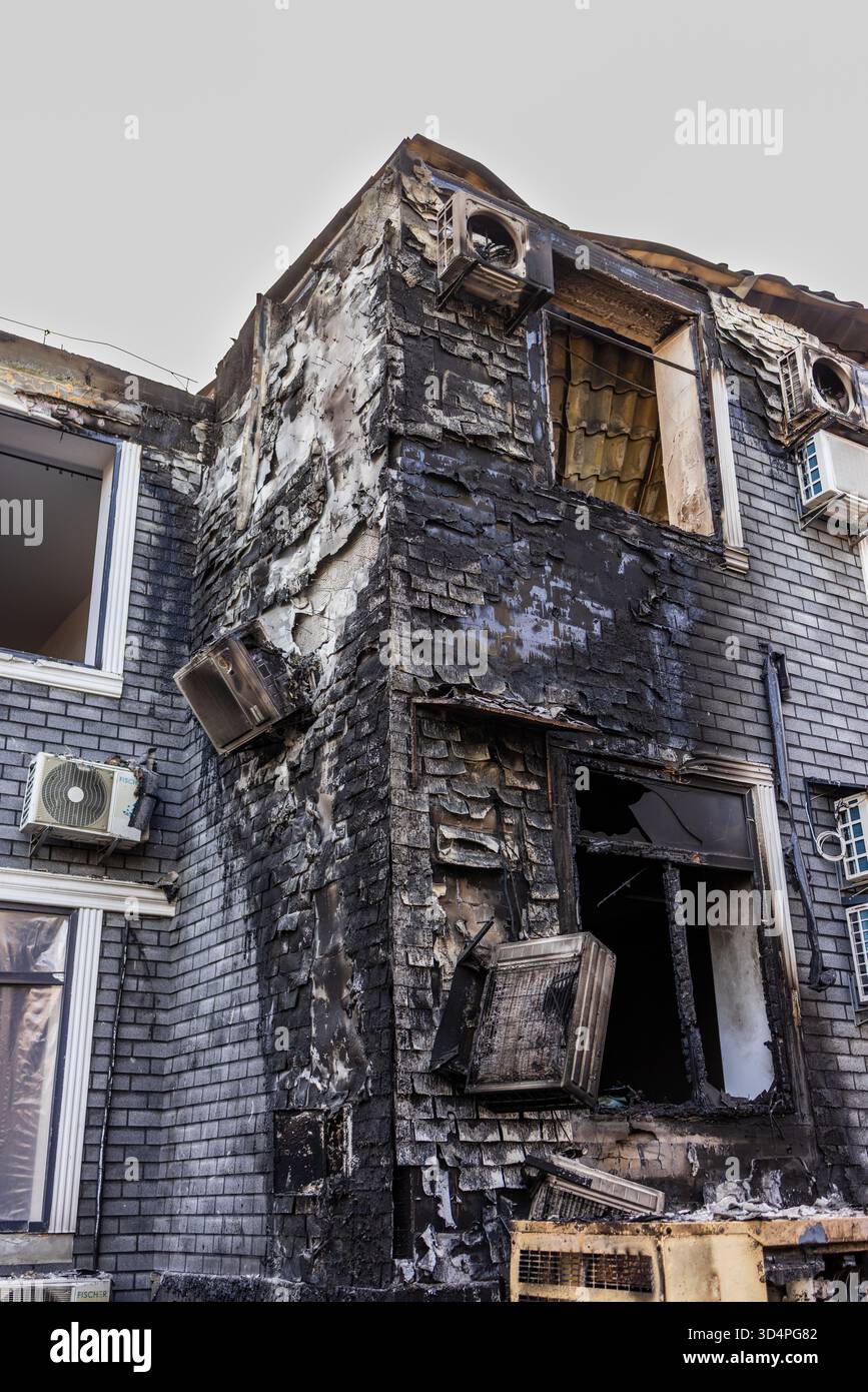 Ravaged Building Ground level view of fire ravaged brick building blackened walls ...