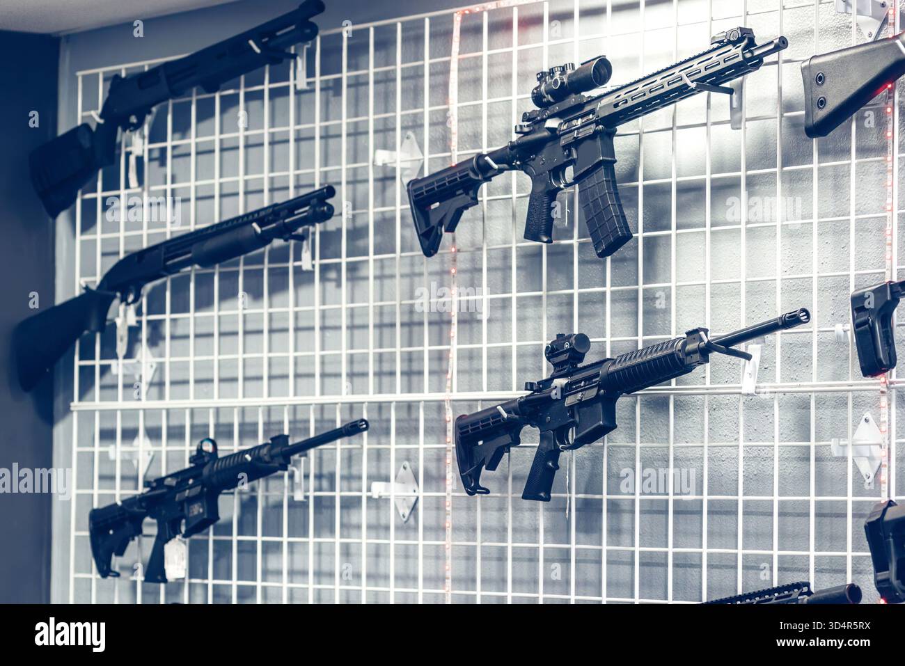 Display of various rifles in a gun shop showcasing different styles and ...