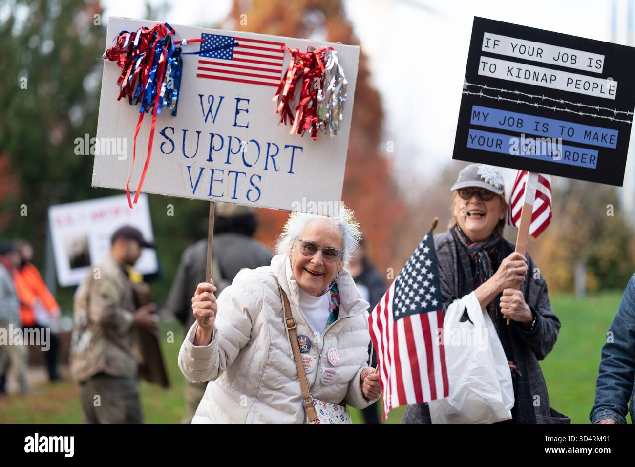 Rita McCarty, left, and Mimi Skerritt react as they see a person ...