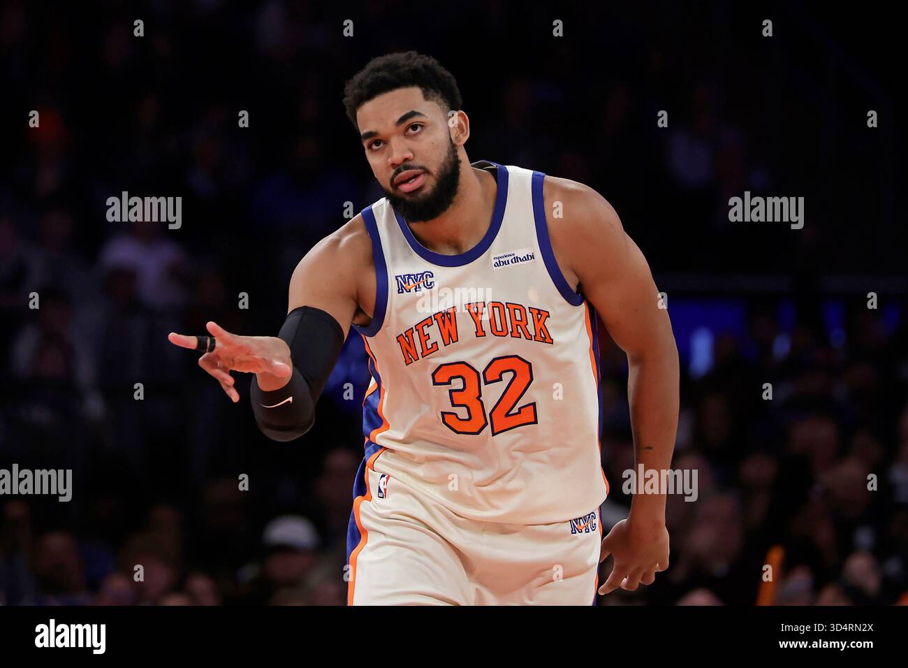 New York Knicks center Karl-Anthony Towns reacts after making a three ...