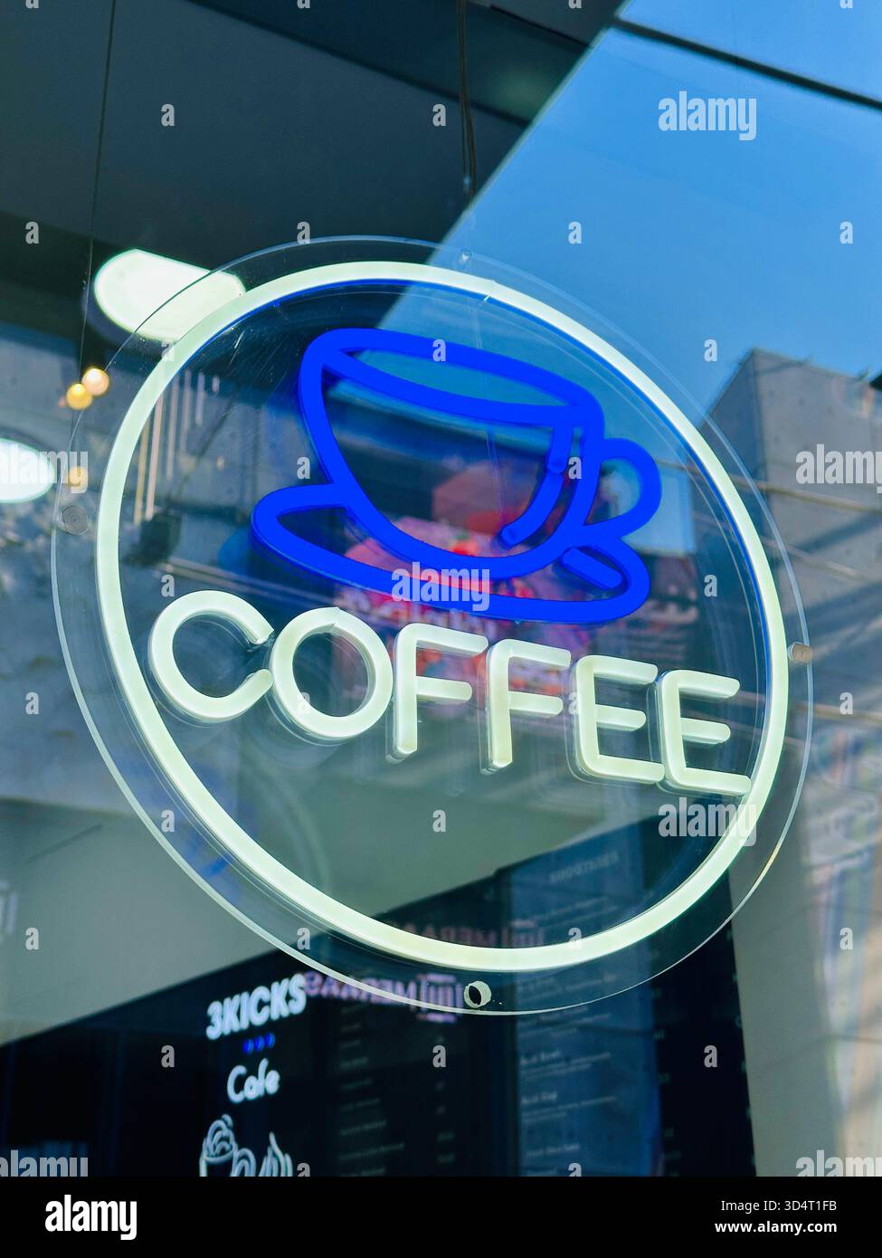 Neon Coffee cup sign shop window - Smartphone Captured Stock Image