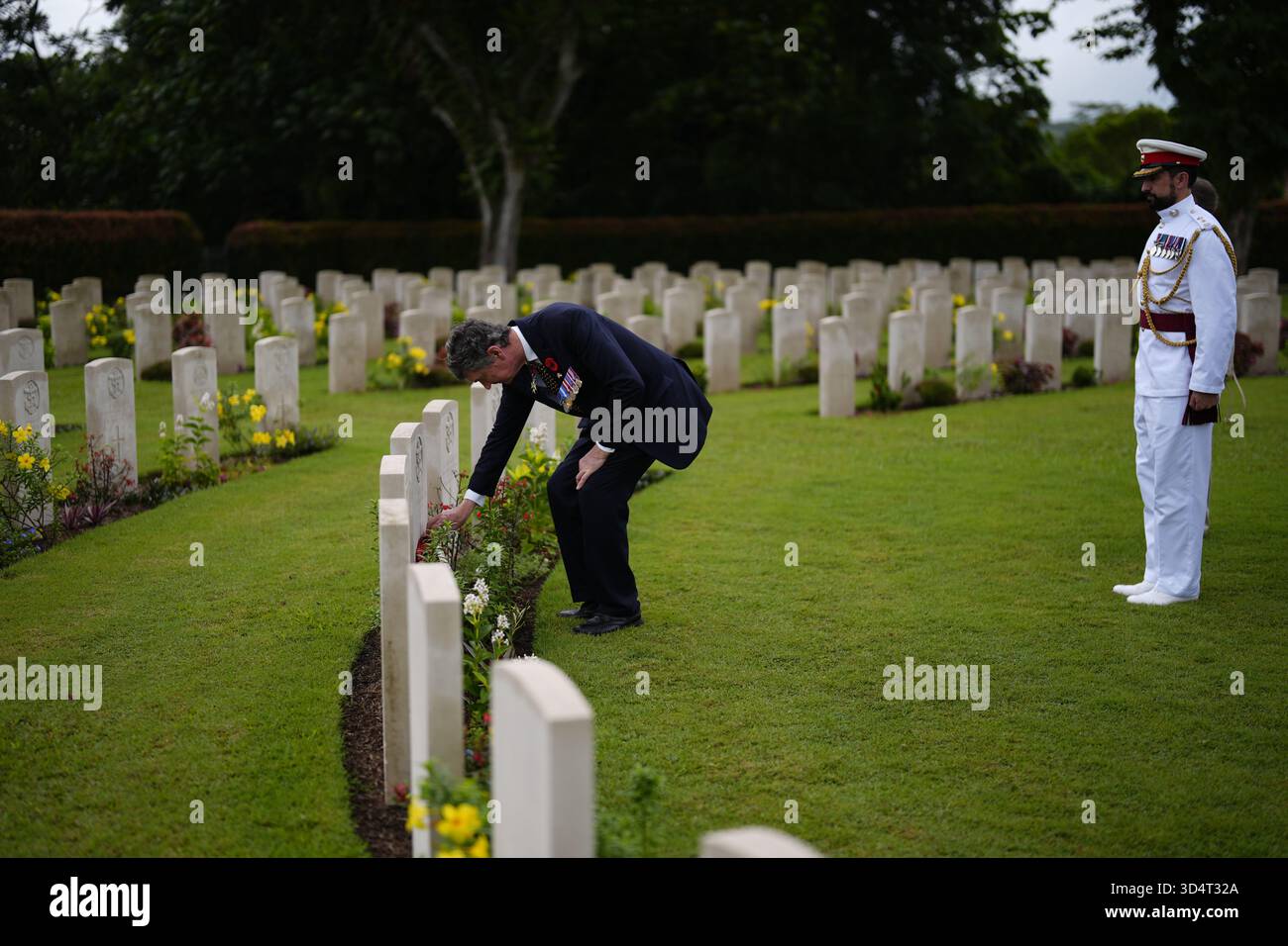 The Princess Royal, President of the Commonwealth War Graves Commission (CWGC), and Vice Admiral Sir Tim Laurence, lays a wreath on the grave of his relative, Midshipman James Bremridge as part of the two-day visit to Singapore to mark 60 years of diplomatic relations between the UK and Singapore. Picture date: Wednesday November 12, 2025. Stock Photo