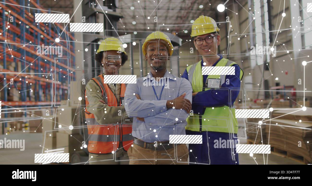 Standing three workers in warehouse wearing yellow hard hats and hi vis ...