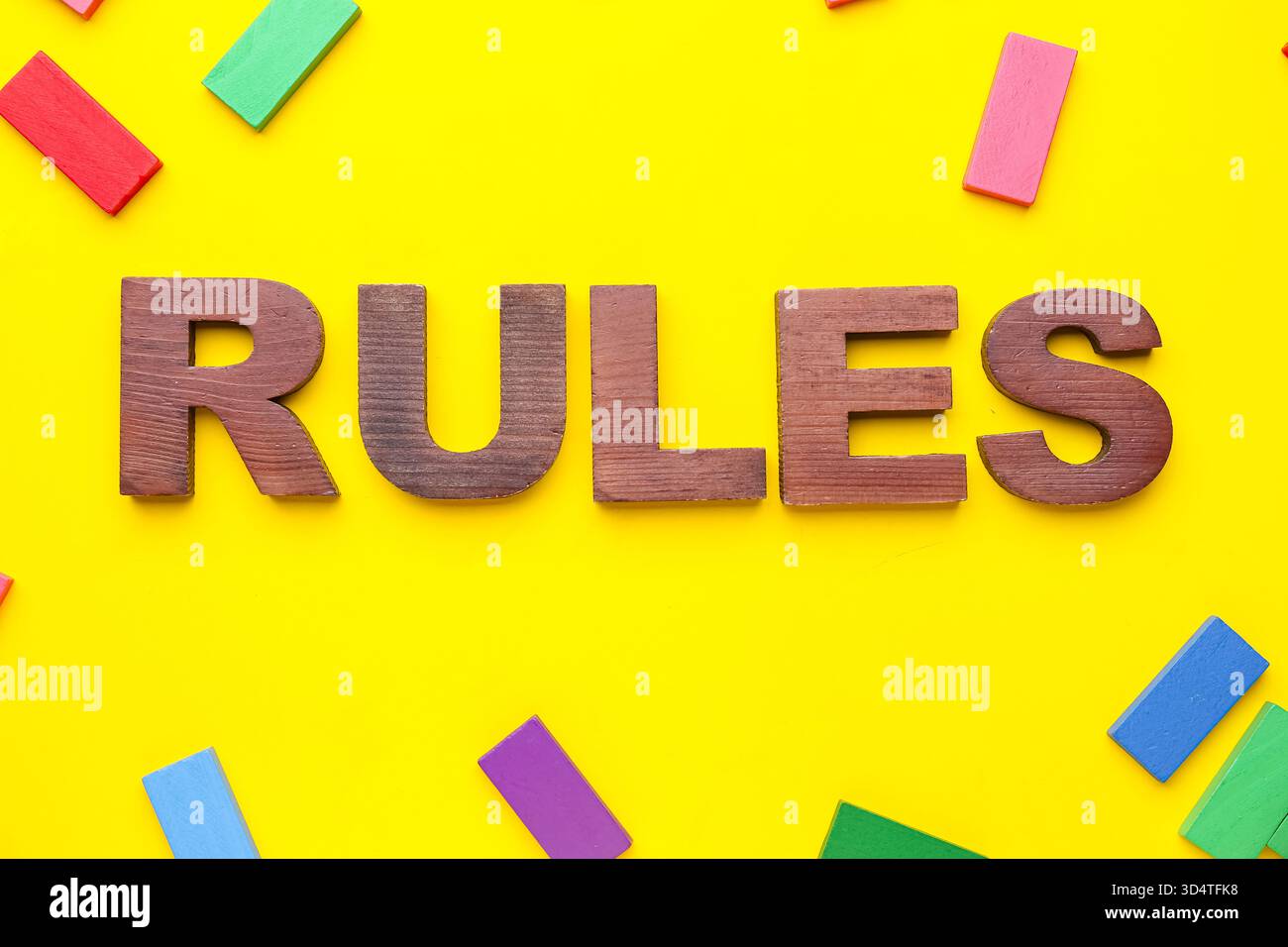 Word RULES with blocks on yellow background Stock Photo