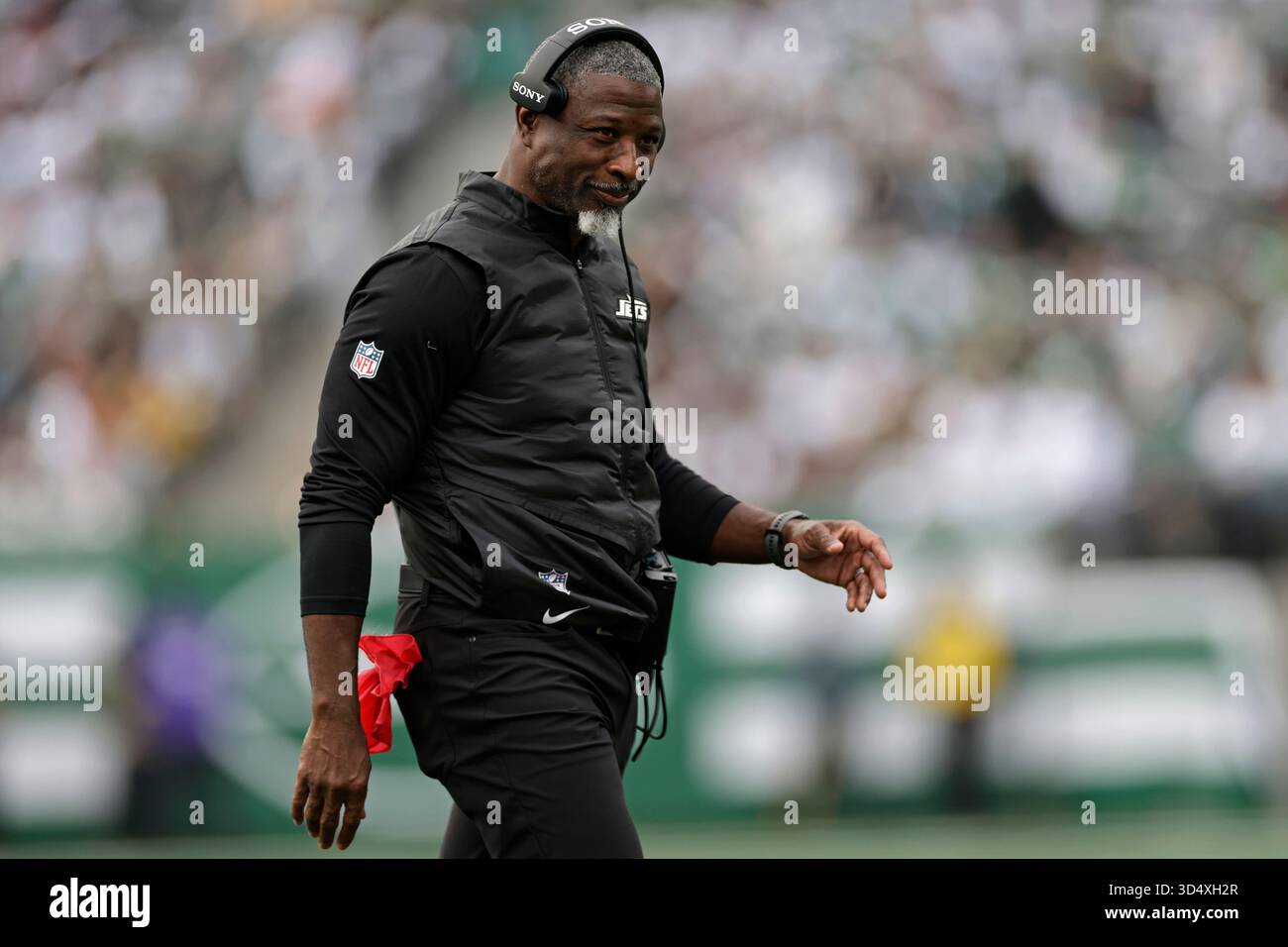 New York Jets head coach Aaron Glenn reacts during an NFL football game ...