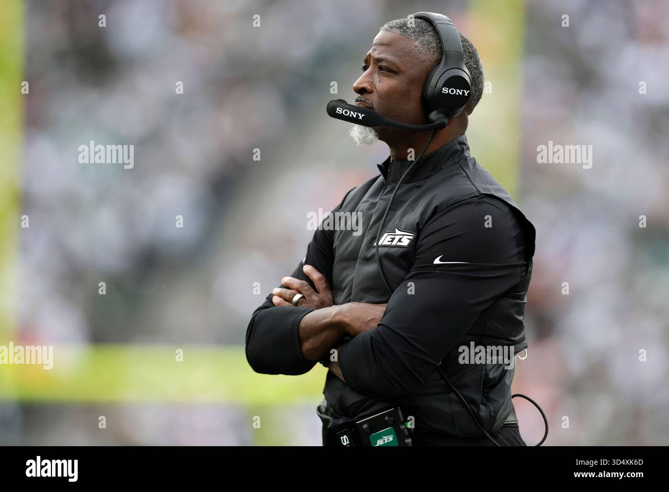 New York Jets head coach Aaron Glenn looks on during an NFL football ...