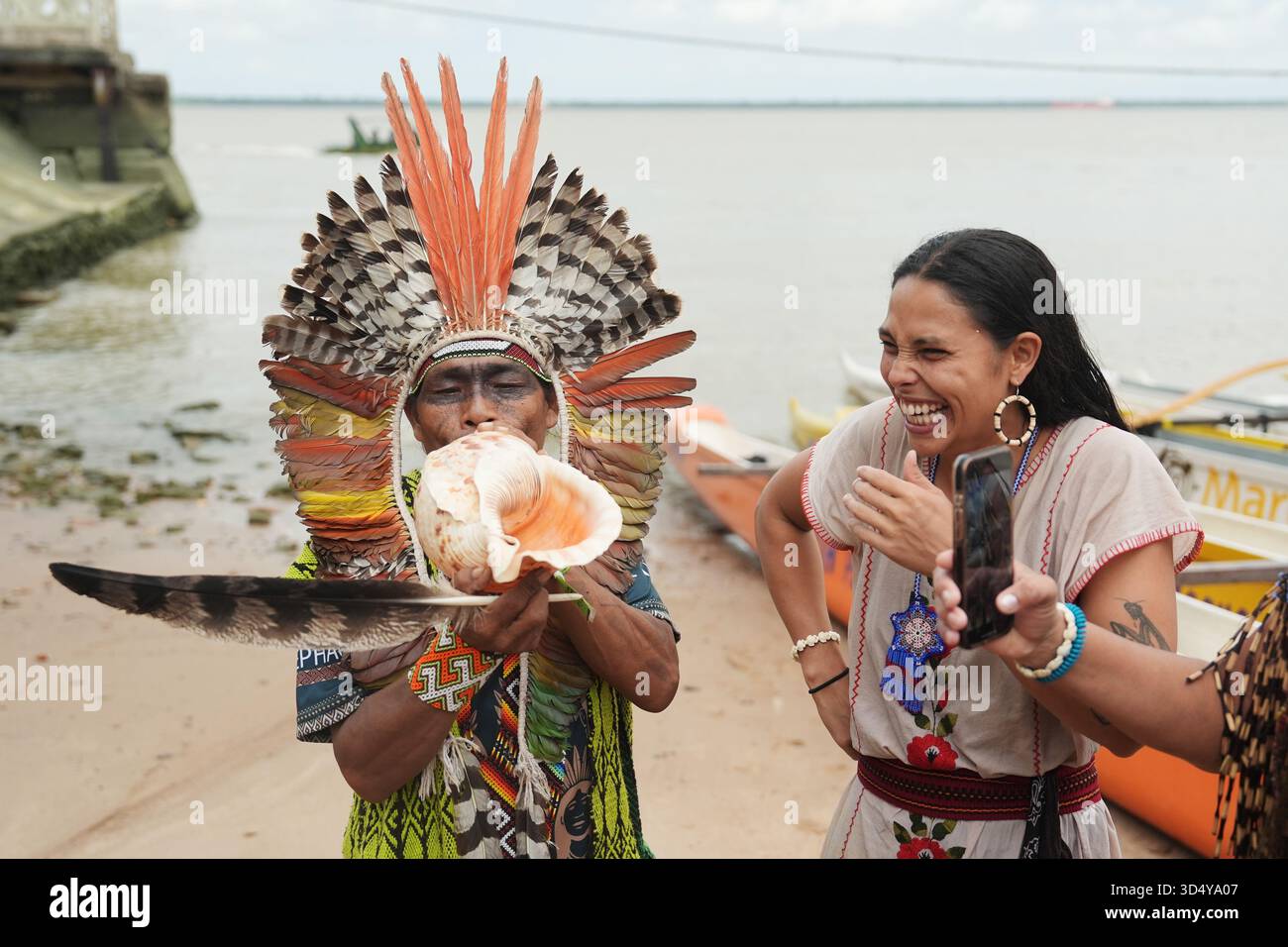 Indigenous Conch Shell An Indigenous person, left, from the Huni Kuin community tries blowing ...