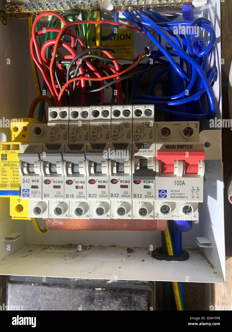 Electric mains unit box with RCBos switch cable cables inside wires cables rcbo red black plastic energy open fitted consumer unit breaker panel main - Smartphone Captured Stock Image