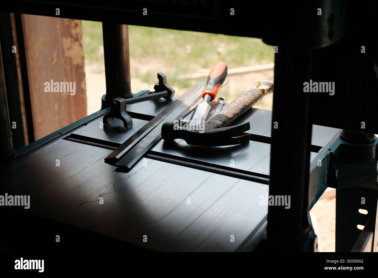 Assorted Hand Tools on Metal Workbench in Workshop Stock Photo