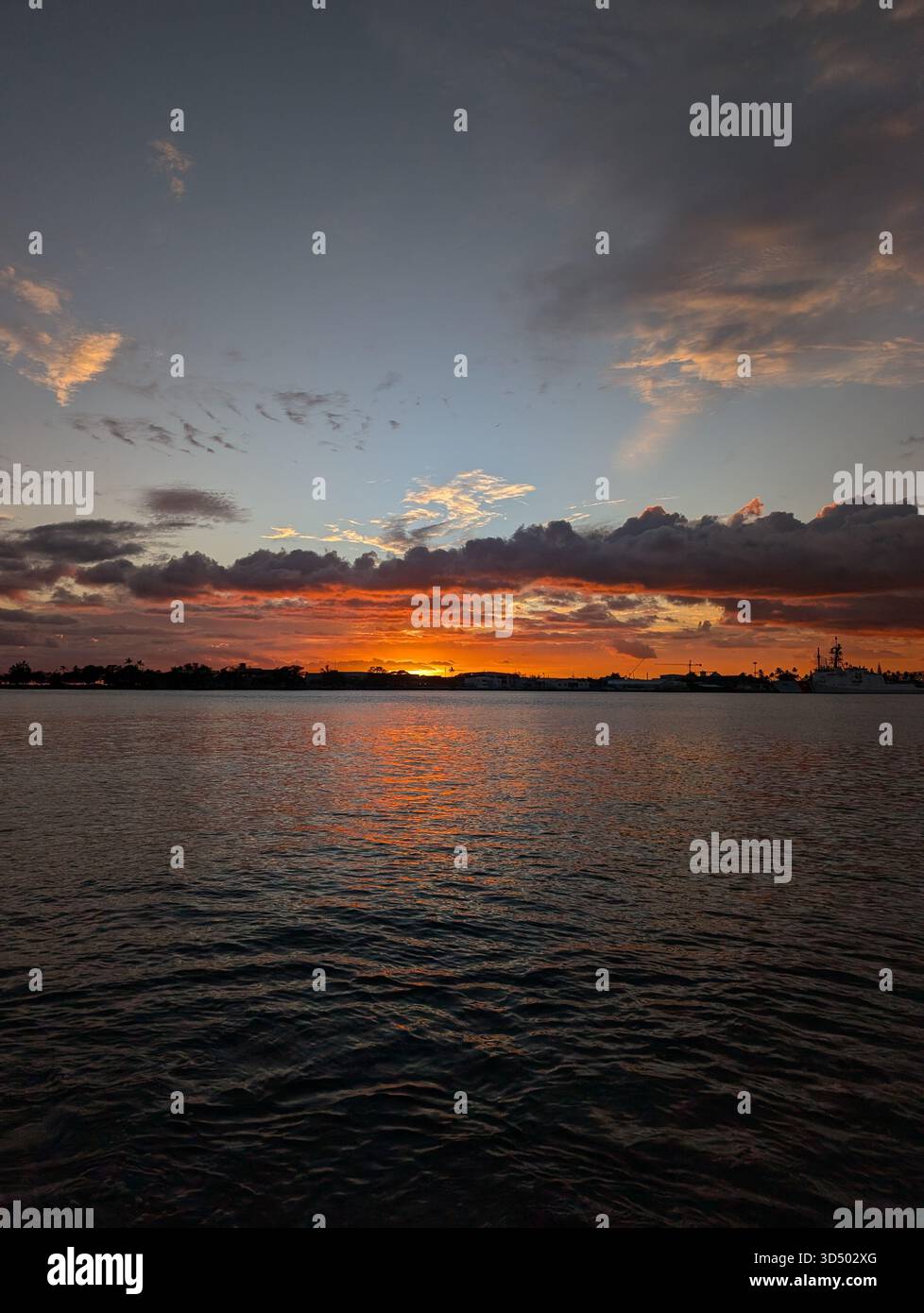 A vibrant Hawaiian dusk on the shore - Smartphone Captured Stock Image