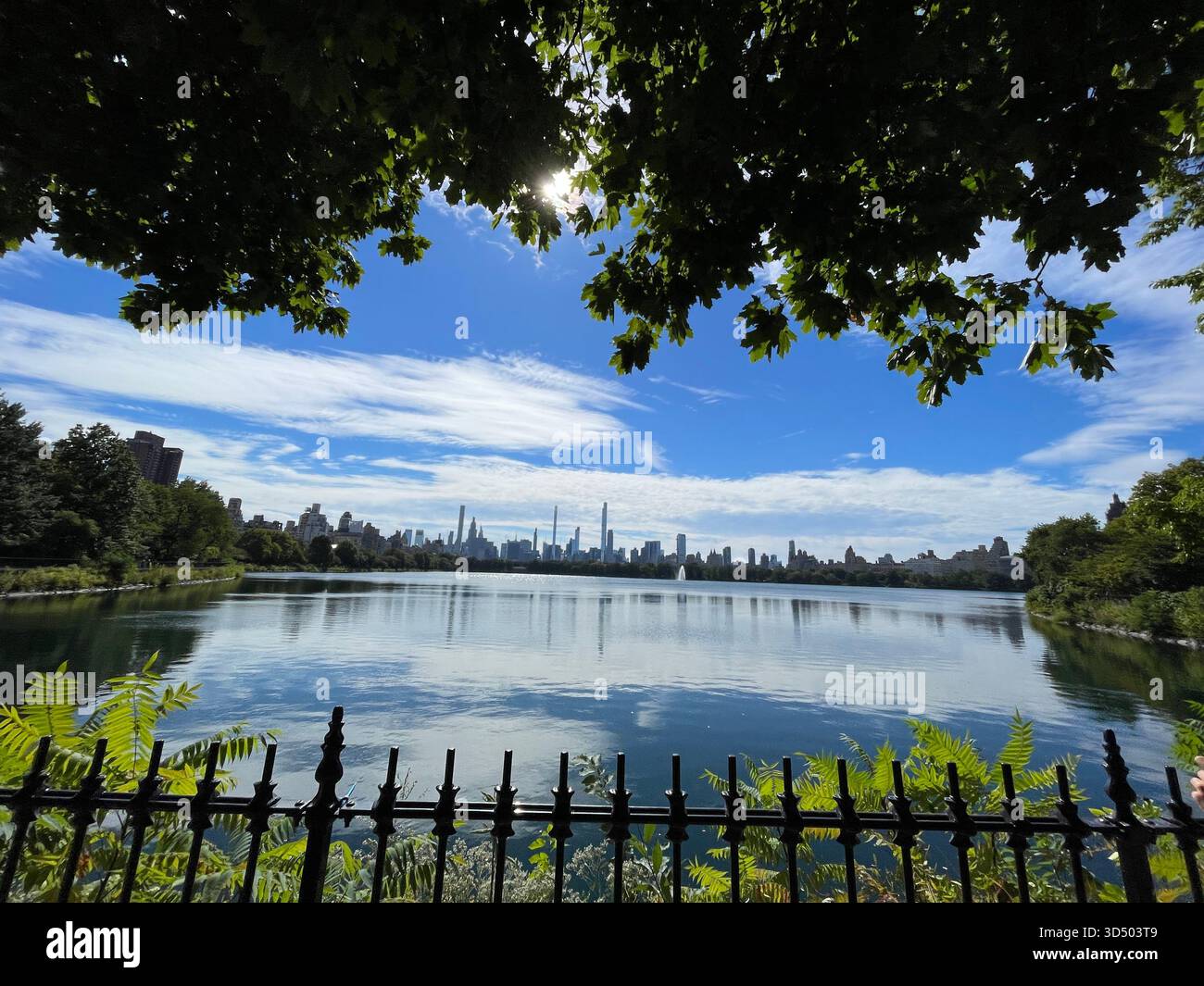 The Central Park Reservoir transforms with the beauty of each season. - Smartphone Captured Stock Image