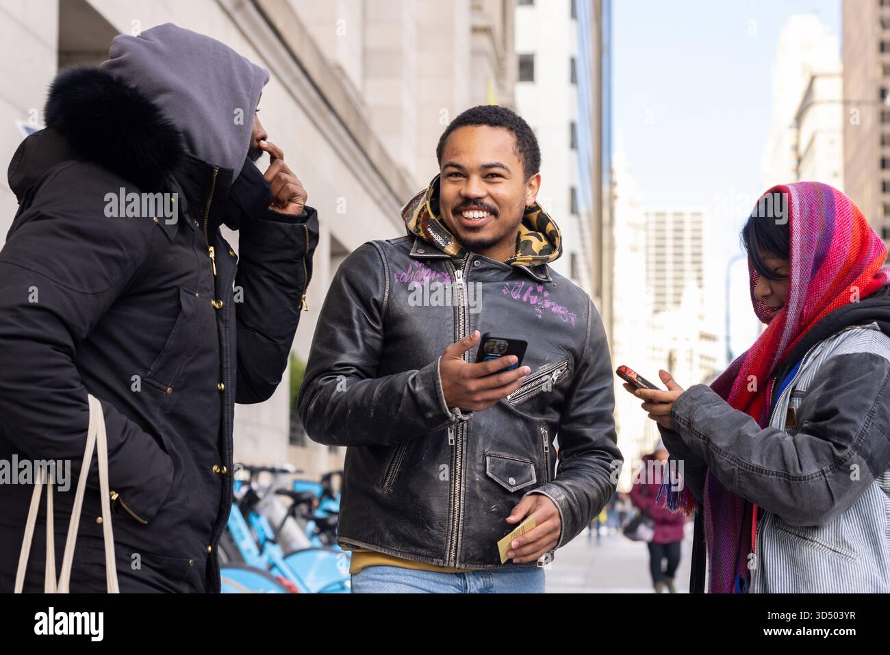 Chicago rapper Adamn Killa, center, and his friend and social media ...