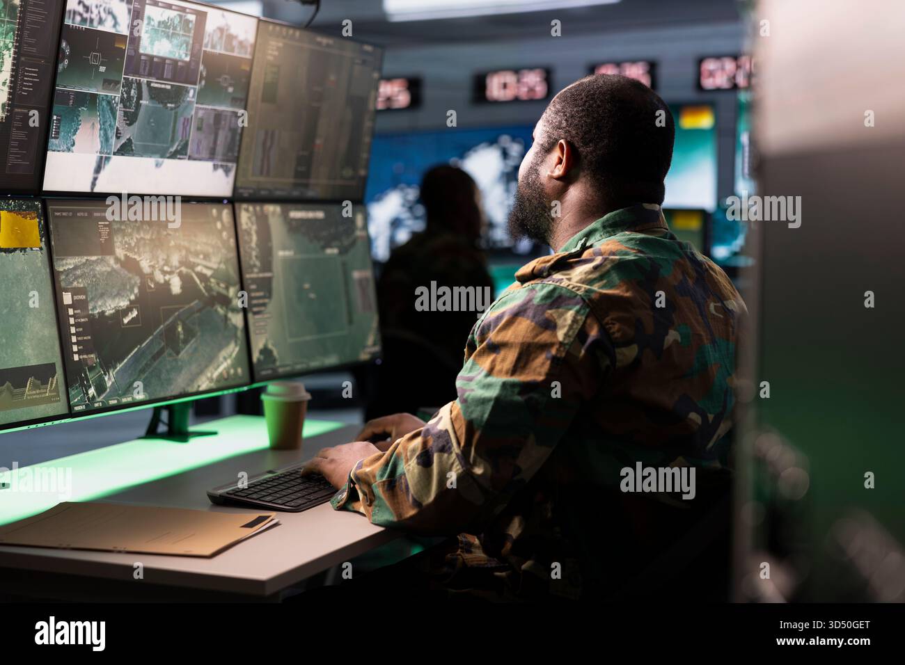 Soldier working in base of operations housing operational missile ...