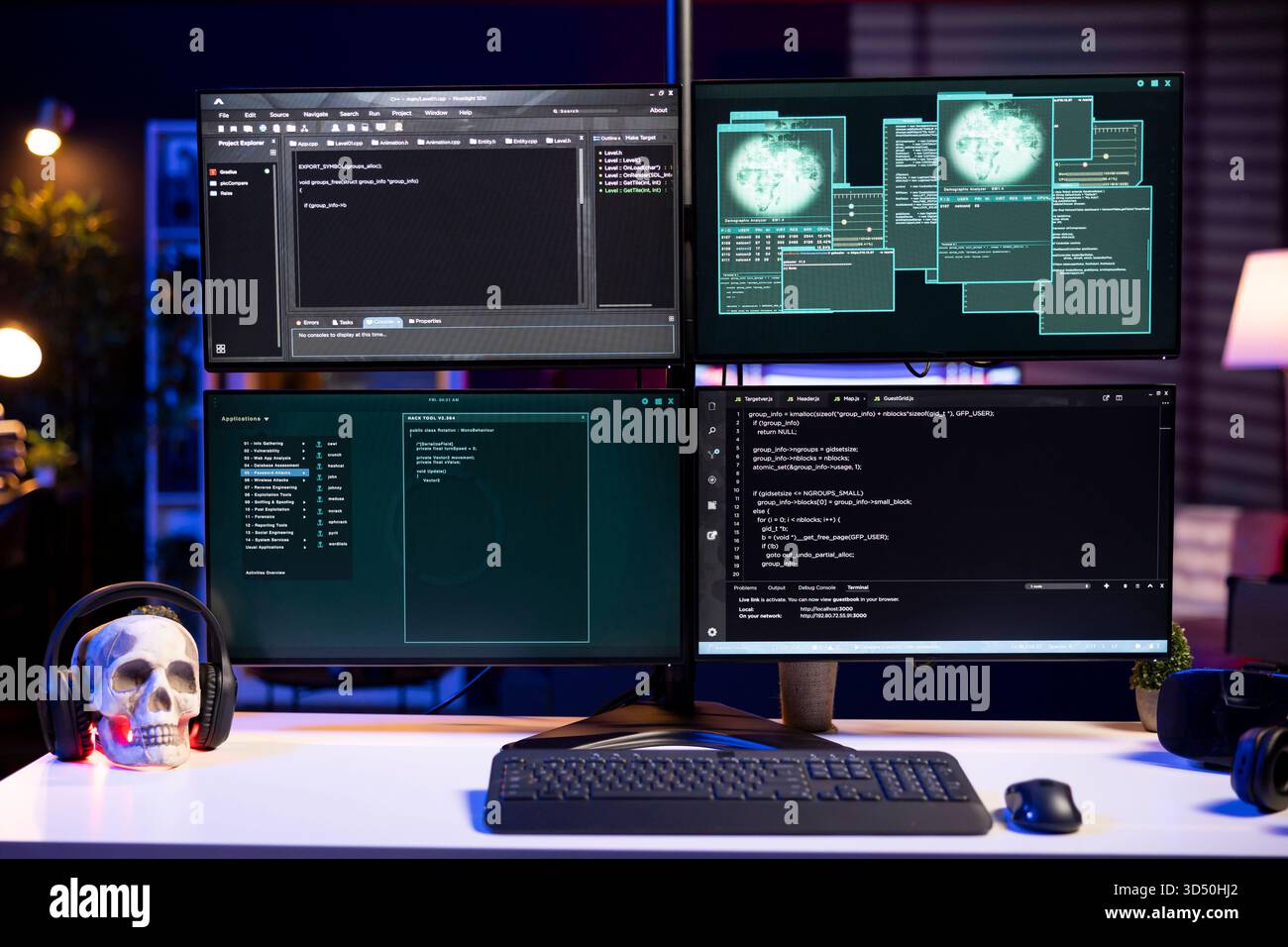Hacking code scripts running on computer system monitors attacking firewalls. Programming language malware software shown on PC screen used by cyber criminals to breach security Stock Photo