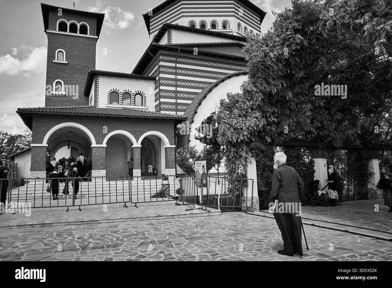 pilgrims at the gate of Pantocrator Monastery in Teleorman County, Romania Stock Photo