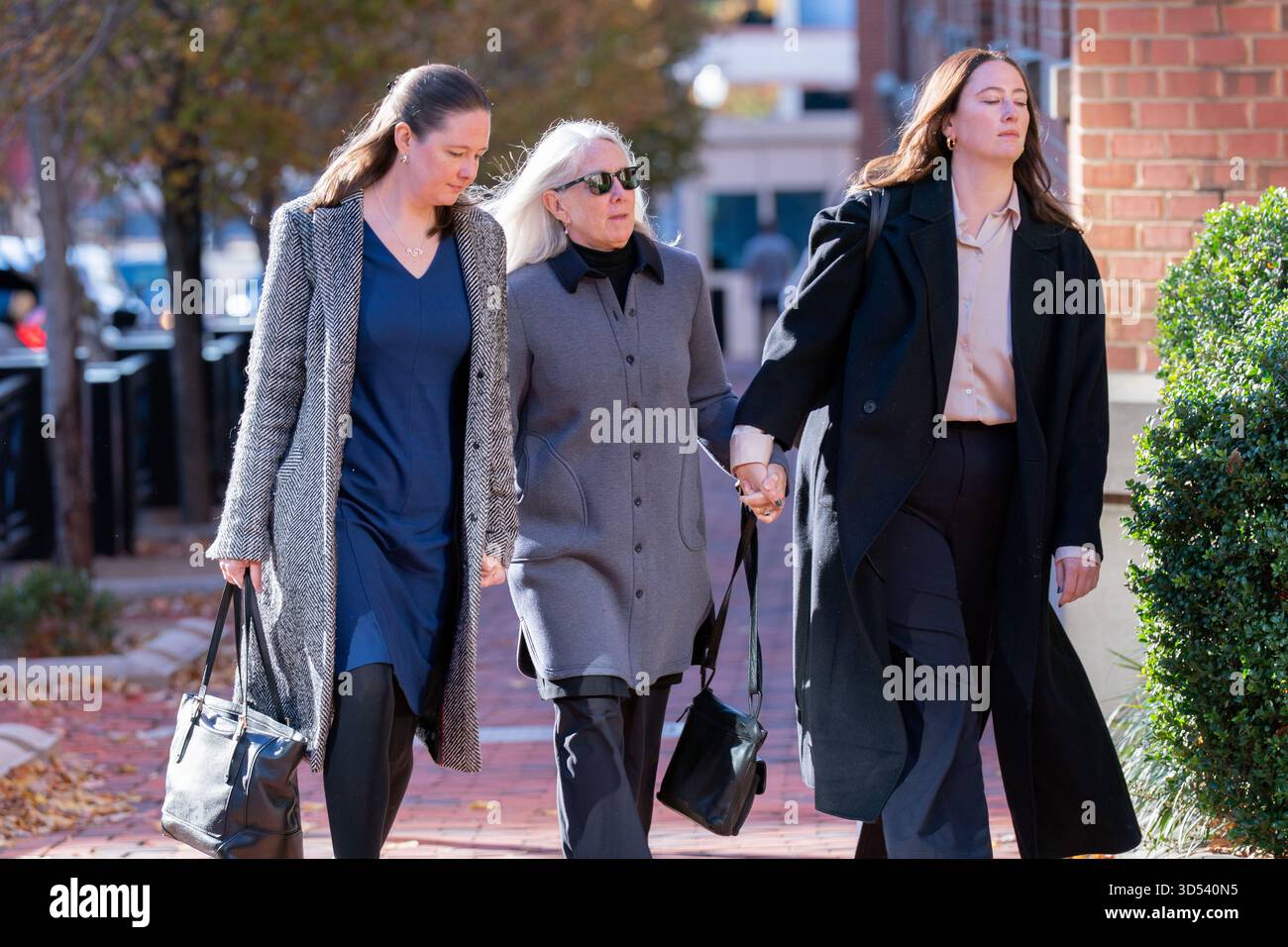 Patrice Failor, wife of former FBI Director James Comey, center, Claire ...