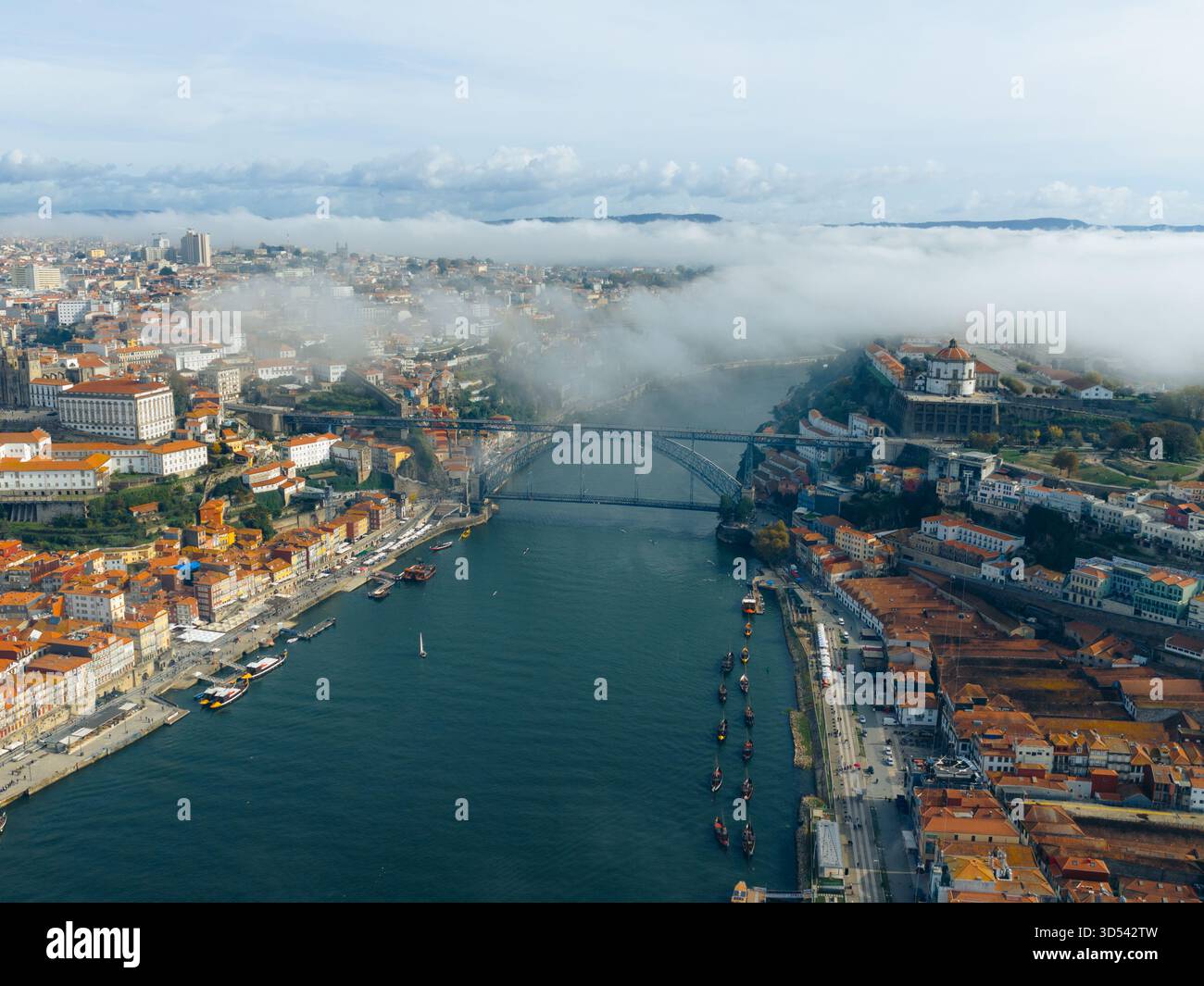 Aerial view of the Dom Luís I Bridge spanning the Douro River amidst a ...