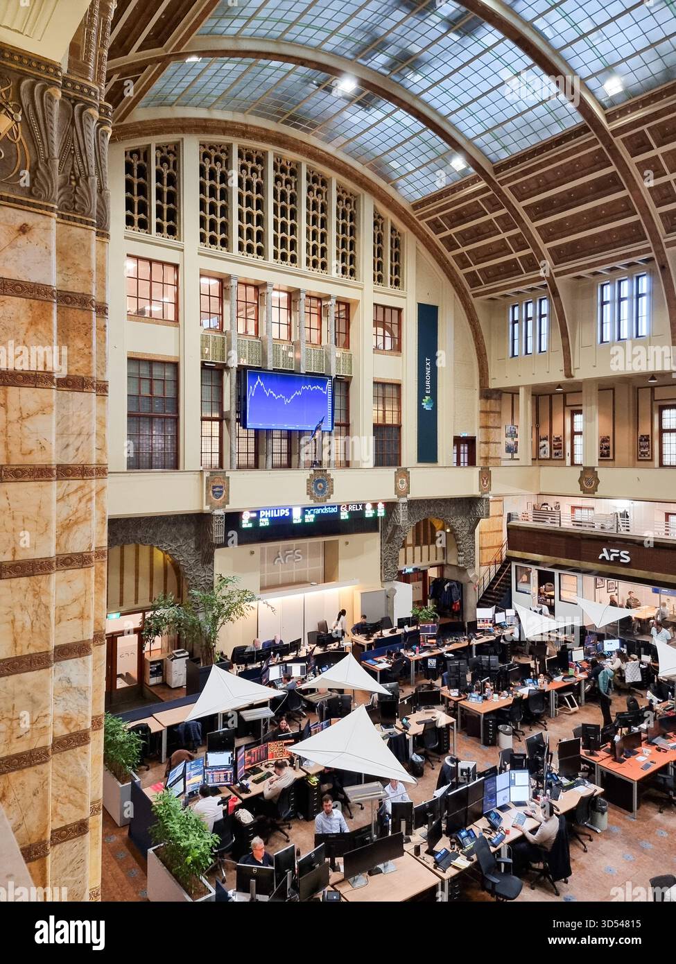 Interior of the historical Euronext Amsterdam stock exchange building by Architect Jos. Th. J. Cuypers , view on former trading floor - Smartphone Captured Stock Image