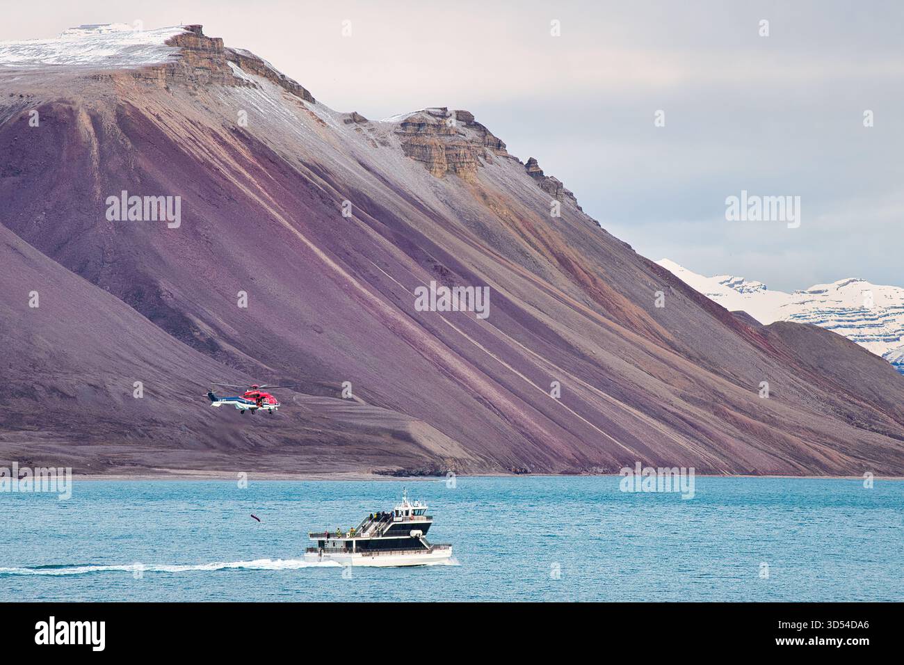Air sea rescue in the challenging conditions of Svalbard in the Arctic Circle. Stock Photo
