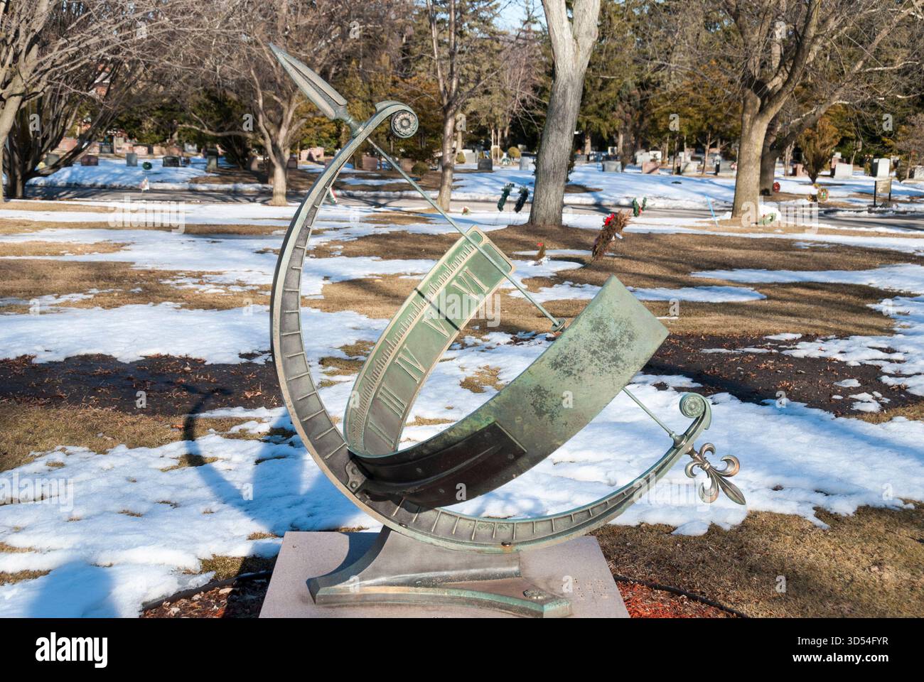 A memorial grave marker in the form of a functional sundial at Mount ...