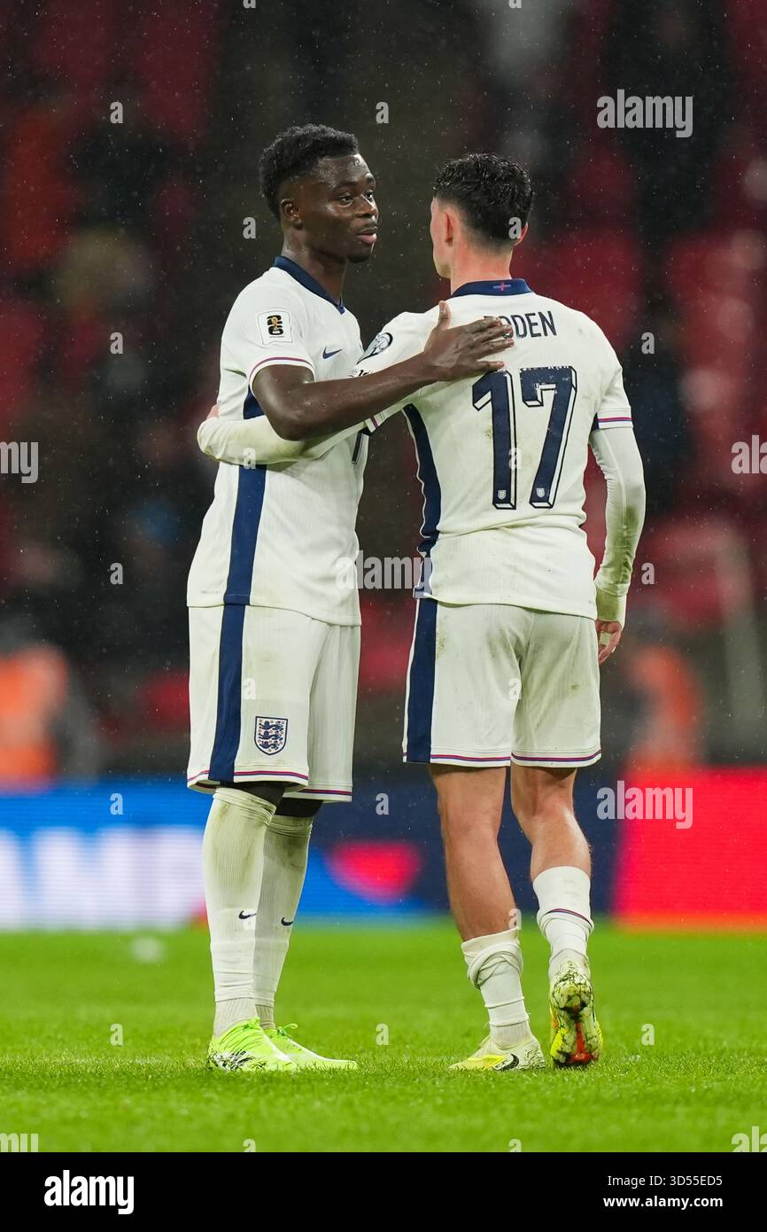 Bukayo Saka of England and Phil Foden of England hugging each other ...