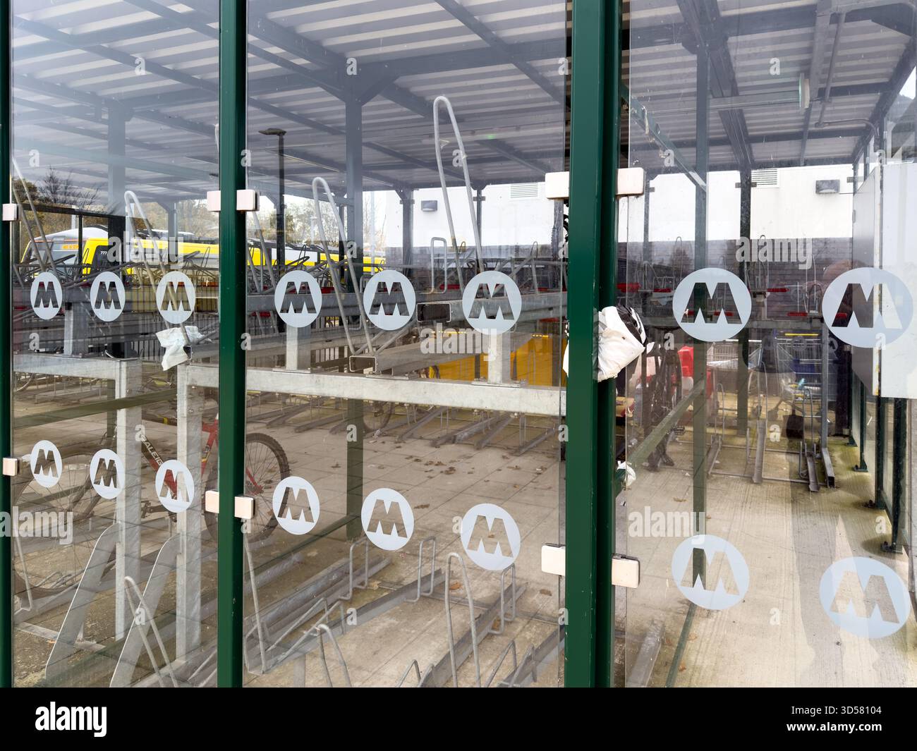 Secured bicycle locker on train station in Headbolt Lane Kirkby Knowsley UK - Smartphone Captured Stock Image