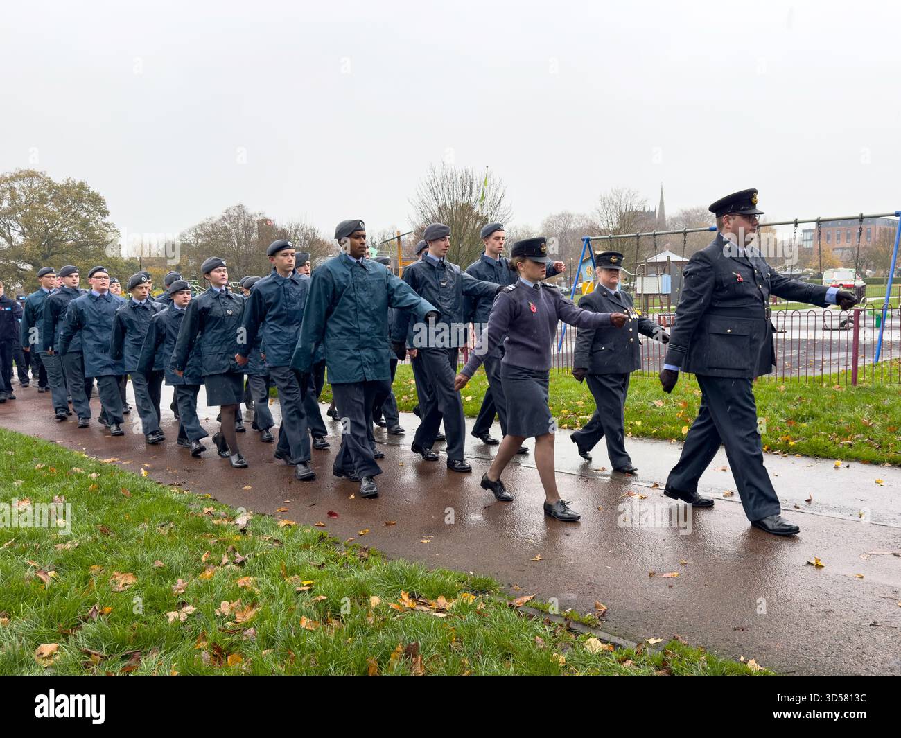 Ormskirk Remembrance Parade, Ormskirk Lancashire UK UK. Despite the pouring rain many people turned out mark the occasion and pay their respects. - Smartphone Captured Stock Image