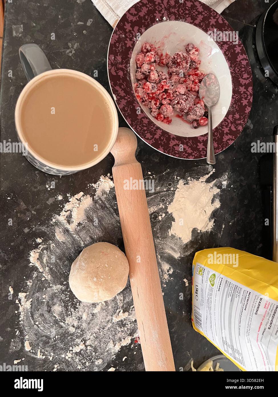 Traditional Ukrainian Berry Dumplings Preparation with Dough, Rolling Pin and Fresh Ingredients - Smartphone Captured Stock Image