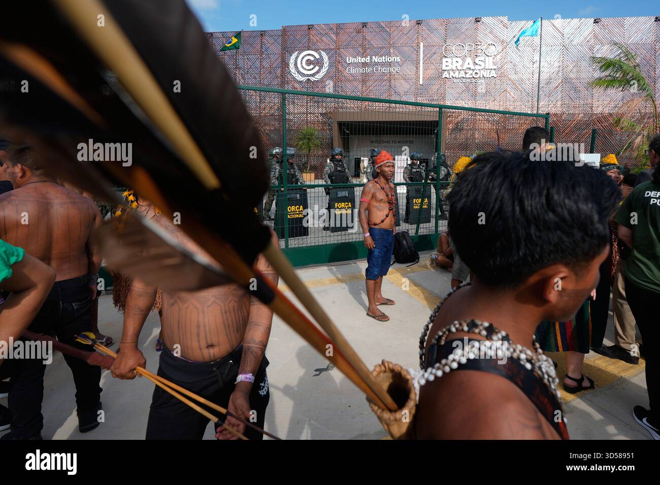 Security personnel block an entrance to the COP30 U.N. Climate Summit ...