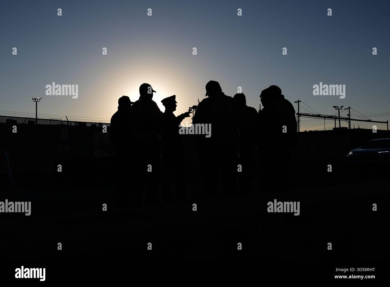 Police guard as protesters gather outside an ICE processing facility in ...