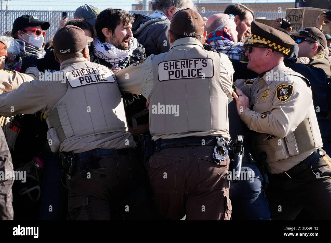 Cook County Sheriff Police guard protesters outside an ICE processing ...
