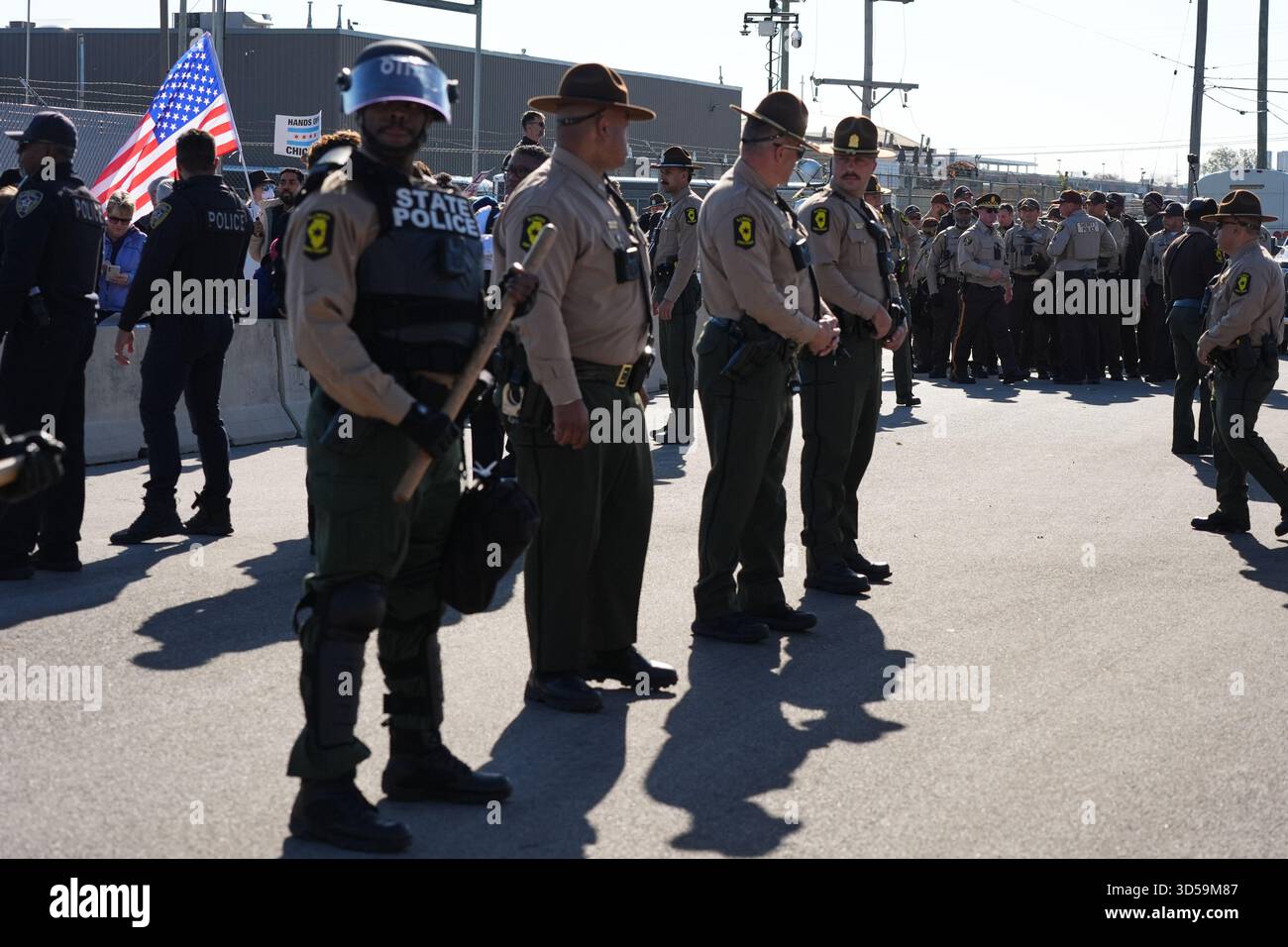 Illinois State Police and Cook County Sheriff Police guard as ...