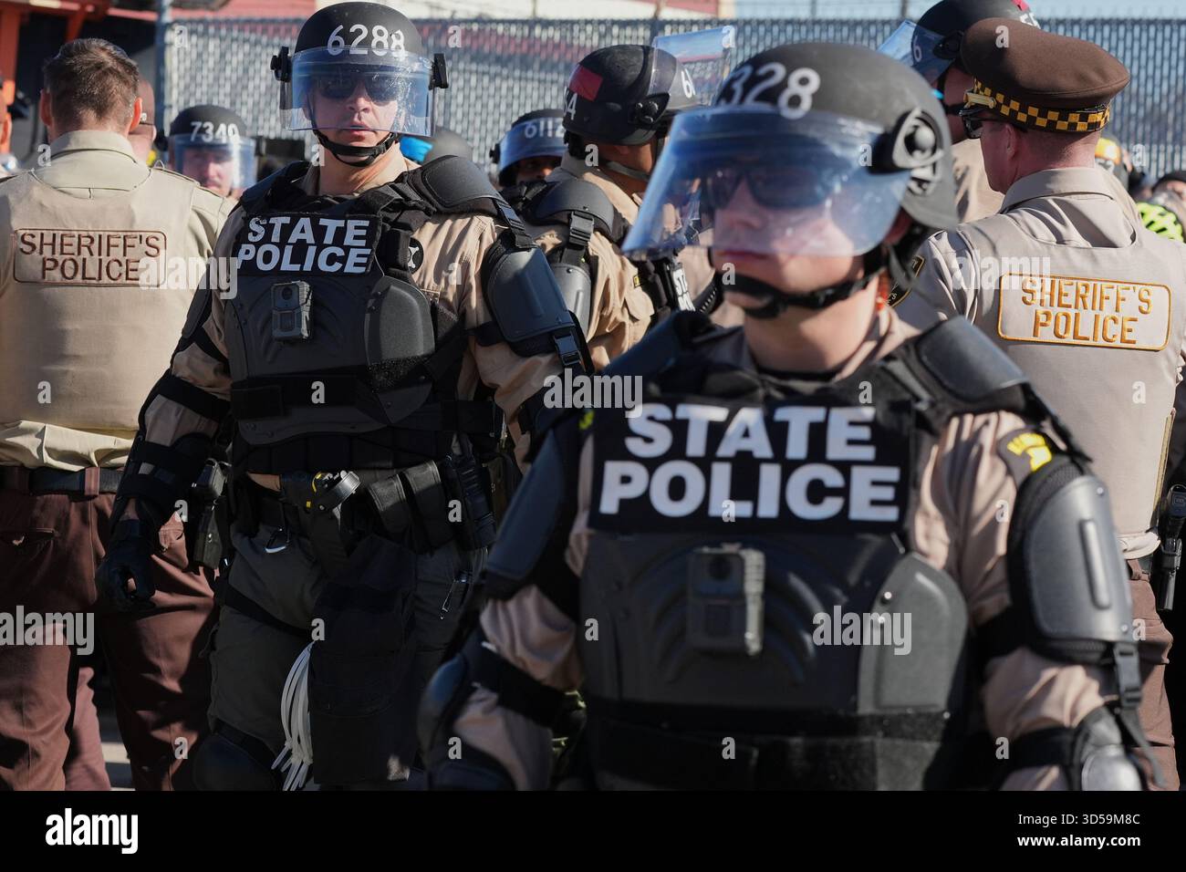 Illinois State Police and Cook County Sheriff Police guard as ...