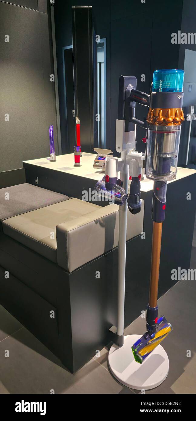 Berlin, Germany - June 17, 2025: Dyson vacuum cleaners are showcased in a contemporary showroom with stylish decor. - Smartphone Captured Stock Image