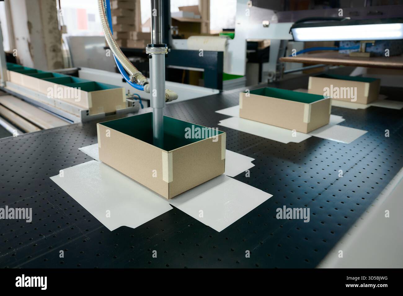 Innovative robotic technology enhances gluing process in cardboard box ...