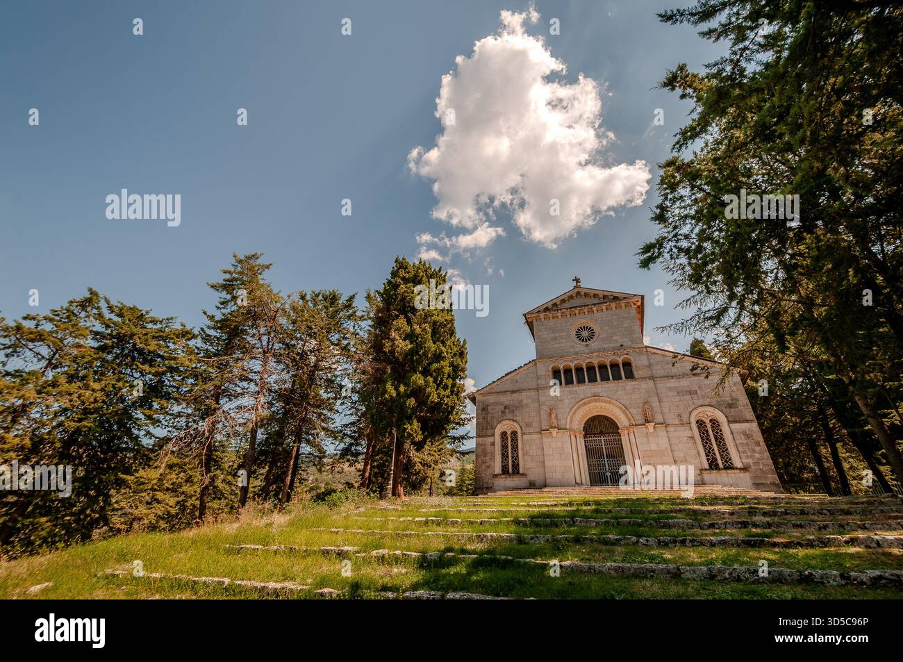 Church of S. Maria dell’Auricola. The white bulk of the church, dating back to the 13th century, stands out on the summit of the homonymous hill, at a - Stock Image