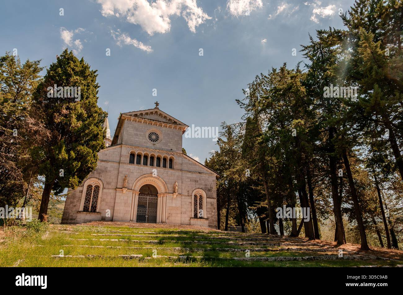 Church of S. Maria dell’Auricola. The white bulk of the church, dating back to the 13th century, stands out on the summit of the homonymous hill, at a - Stock Image