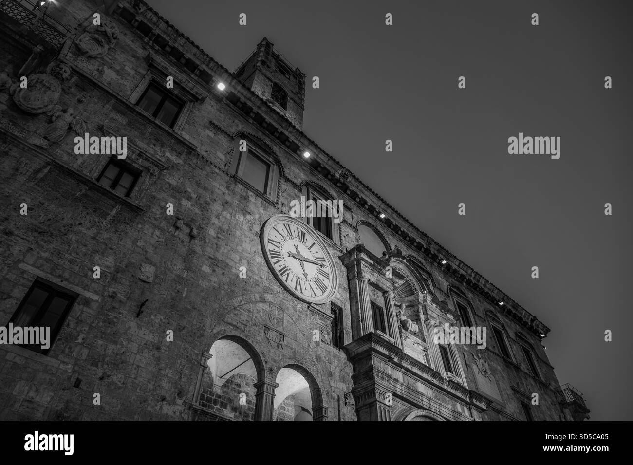 The Palazzo dei Capitani del Popolo is one of the best known historical buildings in Ascoli Piceno. With its medieval crenellated tower it rises next - Stock Image