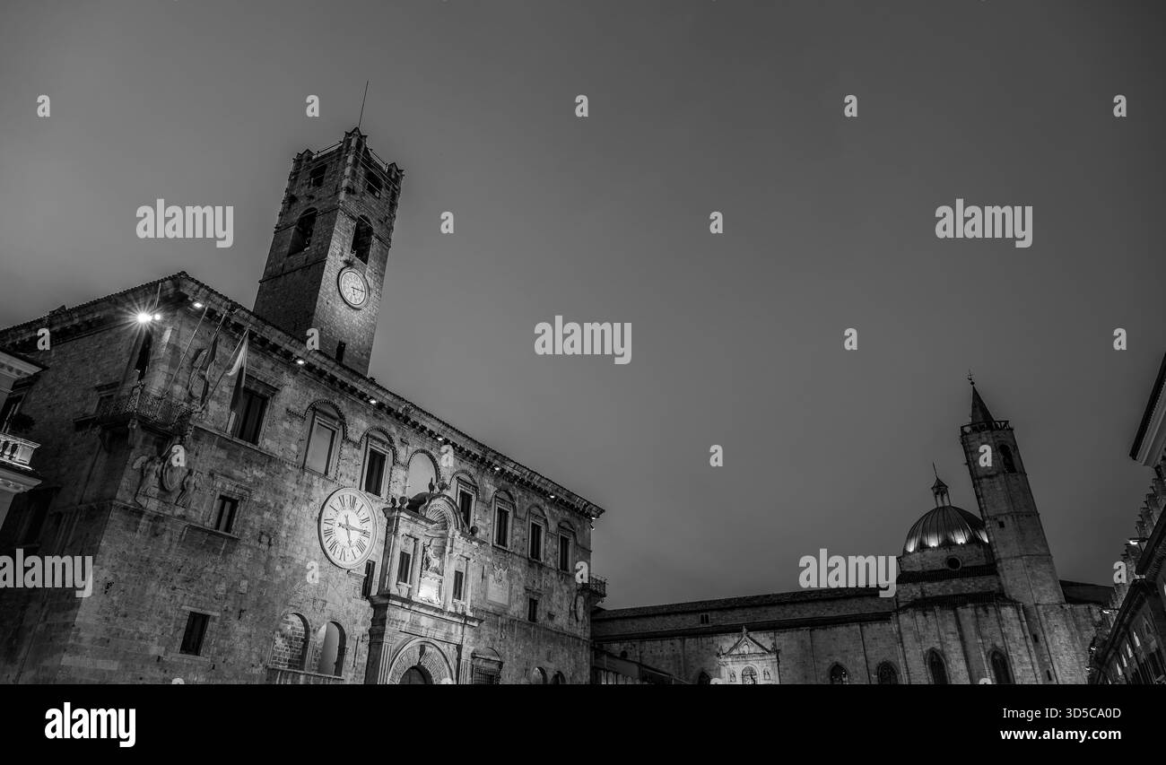 The Palazzo dei Capitani del Popolo is one of the best known historical buildings in Ascoli Piceno. With its medieval crenellated tower it rises next - Stock Image