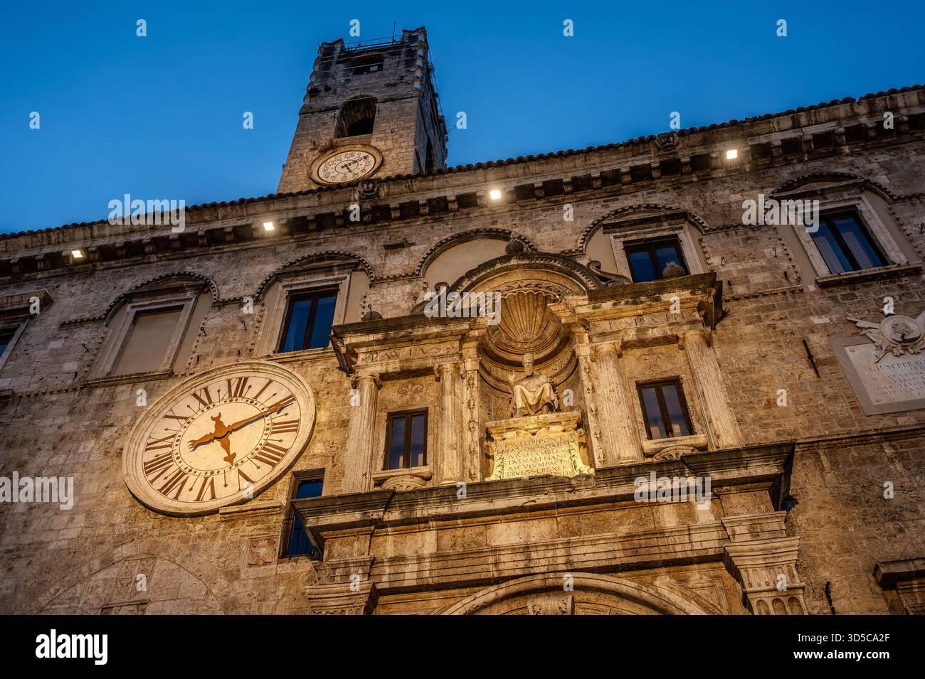 The Palazzo dei Capitani del Popolo is one of the best known historical buildings in Ascoli Piceno. With its medieval crenellated tower it rises next - Stock Image